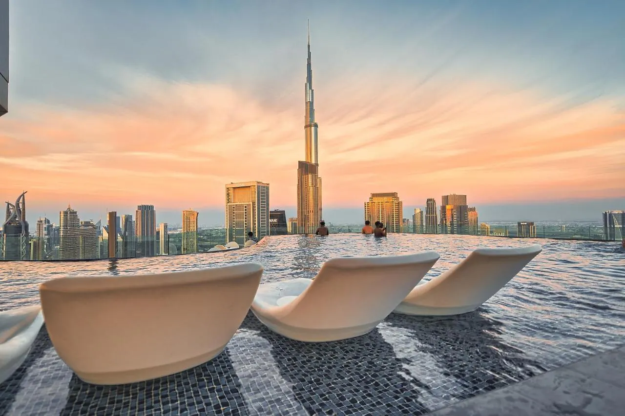Magical Apartment With Rooftop Pool & Burj Khalifa View contacts